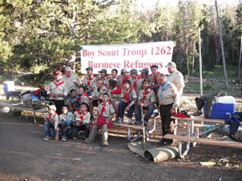Boy Scout Troop 1262 pose in full uniform during summer camp.