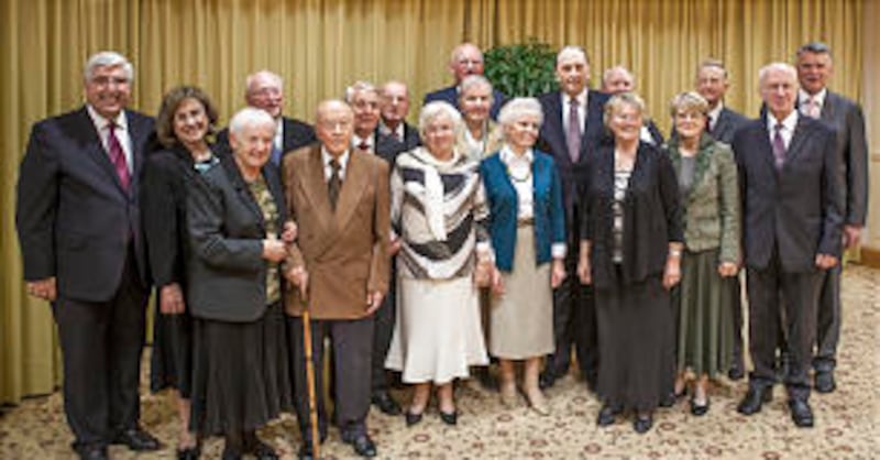 President Thomas S. Monson, fourth from the right on the back row, hosted a dinner in Dresden on Oct