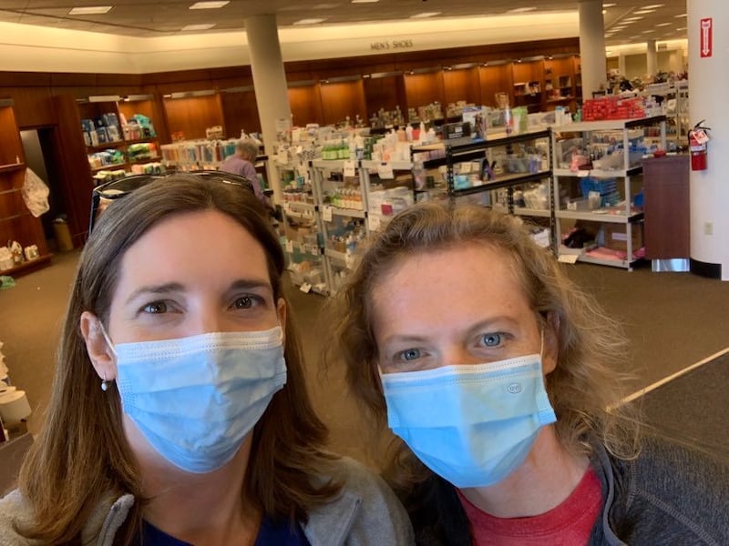 Selfie of Shelly Olivier and Sara Strong in front of shelves in Colorado