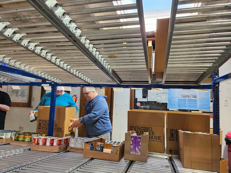 Elder Welch helps package food at Facing Hunger Food Bank in Huntington, West Virginia on ______.
