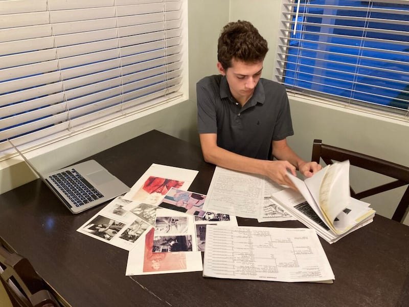 Luke Morrison, 16, works on family history research at his home in Long Beach, California, in October 2020.