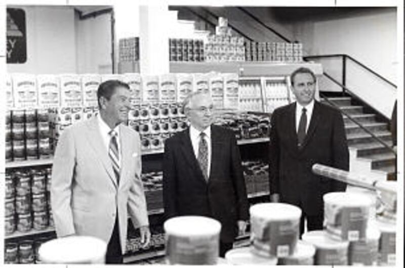 From left, President Ronald Reagan, President Gordon B. Hinckley and Elder Thomas S. Monson tour th