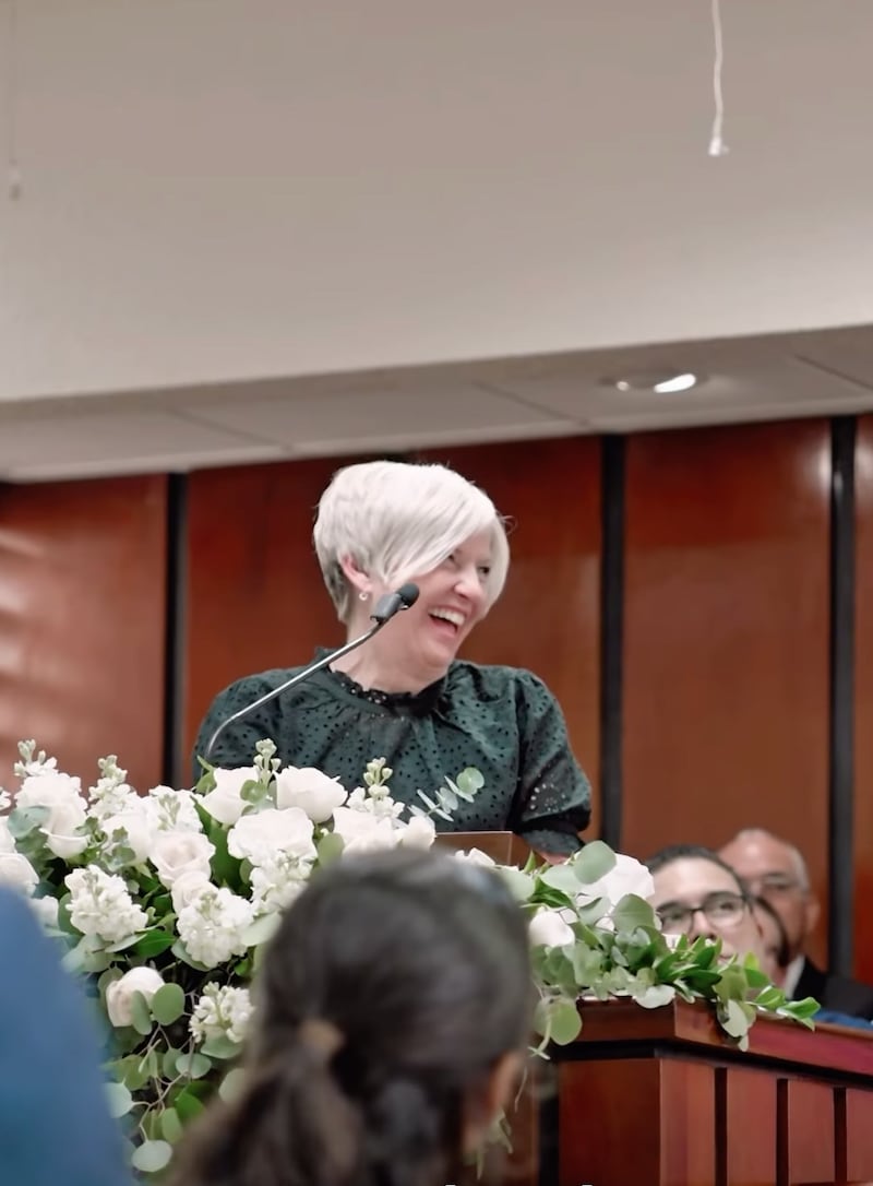 President Emily Belle Freeman shares a message from the pulpit while ministering in Puerto Rico in May 2026.