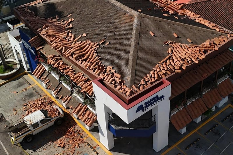 Roof tiles lie scattered on the ground after an earthquake struck Villa de los Santos, Panama, Saturday, Oct. 10, 2026.