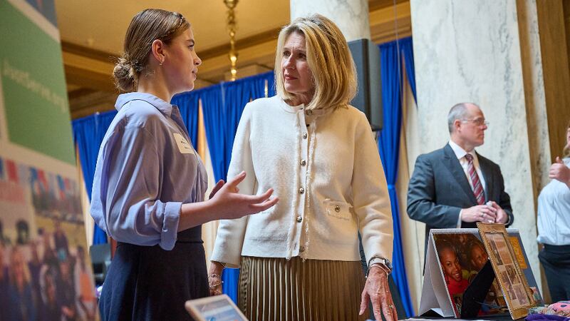 Relief Society President Camille N. Johnson speaks with Elena Magnusson, JustServe Club leader at Brownsburg Middle School, at the Statehouse in Indianapolis, Indiana.