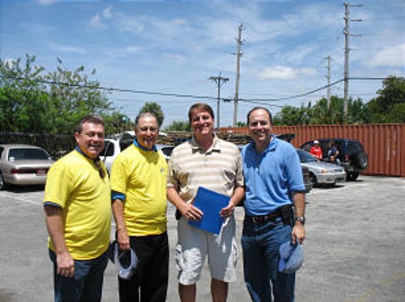 From left, Miami Lakes Stake President, Albert Benzion, Elder Anthony M. Burns, an Area Seventy, Ft.