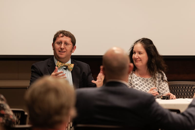 Elizabeth Kuehn, lead editor on the Joseph Smith Papers Financial Records series, right, and Jeffrey Mahas, a volume editor, speak at a Joseph Smith Papers conference in 2022.