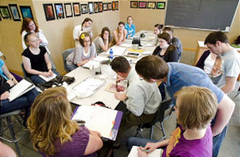 Wade Huntsman demonstrates to his students during an art class at BYU-Idaho. Although the enrollment