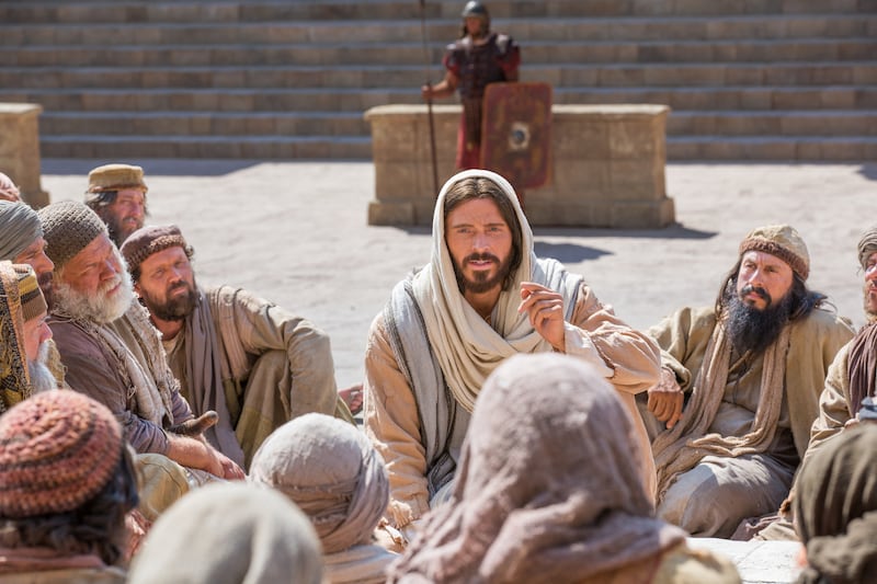Jesus Christ tells a group of people that he is the Good Shepherd in this image from the Bible Video.
