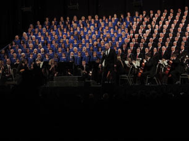 Tabernacle Choir director Mack Wilberg acknowledges the audience during a concert in Columbus, Ohio,