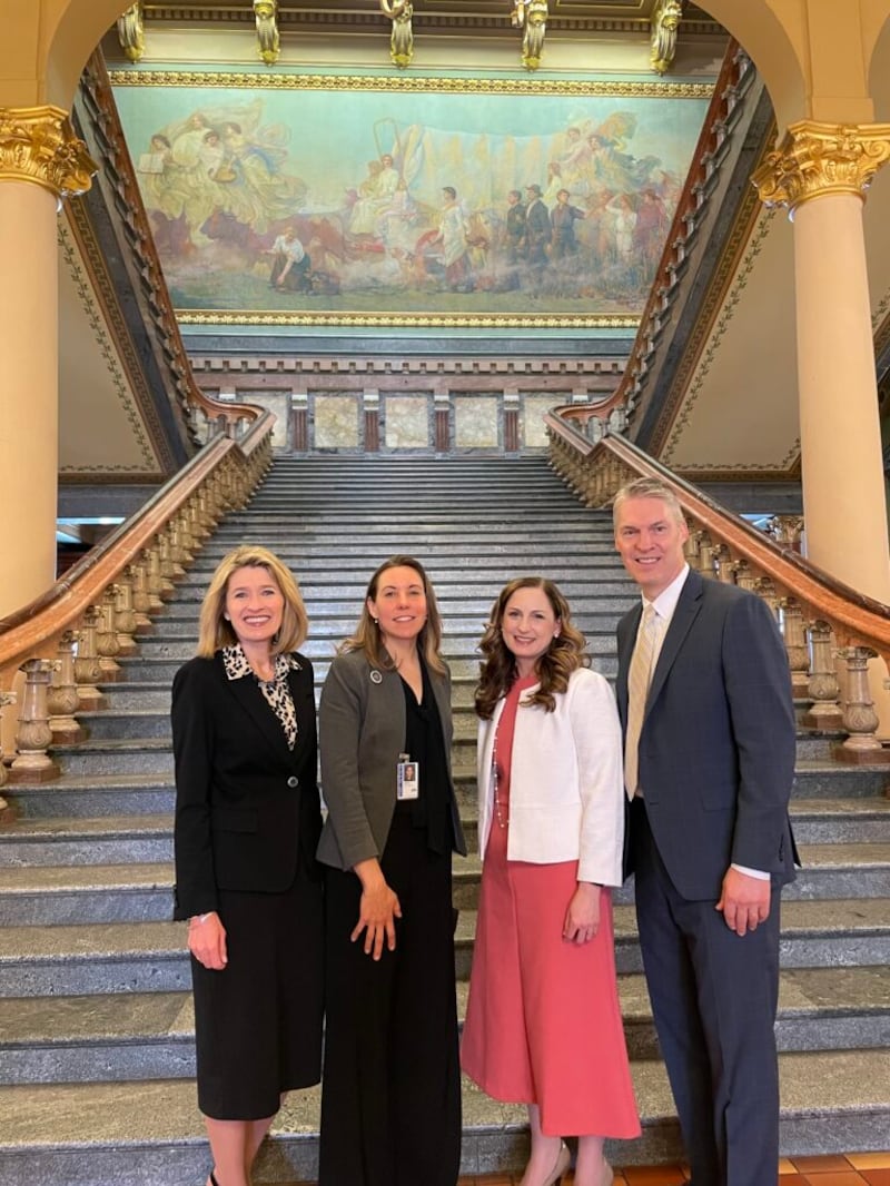 Primary General President Camille N. Johnson, left, Iowa state Sen. Sarah Trone Garriott, Sister Rebecca Morgan, and Elder Jeremiah Morgan, Area Seventy, pose for a photo in the Iowa Capitol in Des Moines, Iowa, on Tuesday, April 19, 2022.