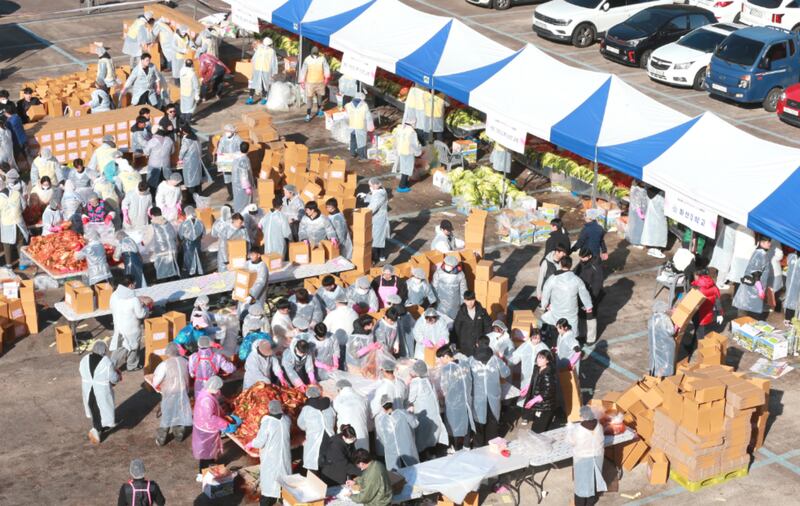 Members and missionaries from the Changwon Korea Stake join the community as volunteers in the "Sharing Kimchi with Love Festival" in Changwon, South Korea, on Dec. 12, 2025.