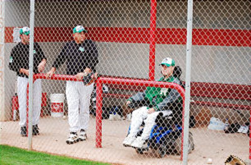 Conner Newland manages Green River High School's baseball team. At left is assistant coach, Rob Maug