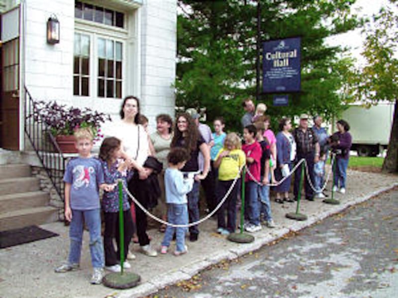 Extras stand in line to participate in filming of Road to Zion: Travels in Church History, produced