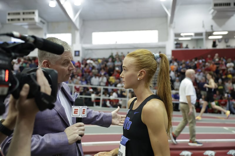 BYU's Jane Hedengren is interviewed by ESPN after winning the 3,000-meter race at the NCAA Indoor Track and Field Championships.