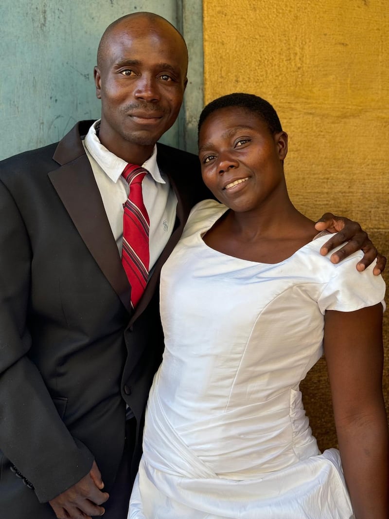 Reginald Magocha and his wife, Eunice, are photographed on the day of their civil marriage.
