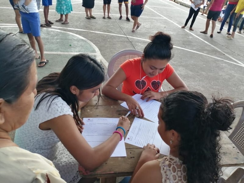 Students gather in the courtyard of one of the schools where Kenneth Grover sponsors scholarships in Guatemala.