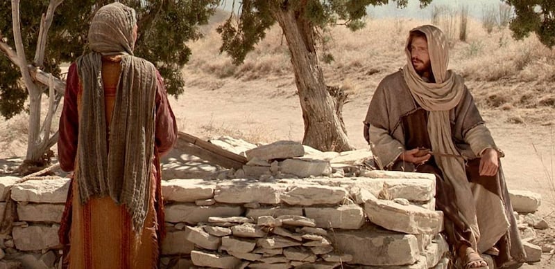 Jesus teaches the Samaritan woman at the well in this image from the Church's Bible Videos.
