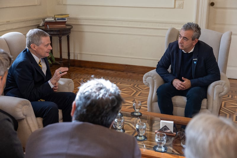 Elder David A. Bednar of the Quorum of the Twelve Apostles, left, speaks with Mayor Pablo Javkin at the Municipal Palace in Rosario, Argentina.