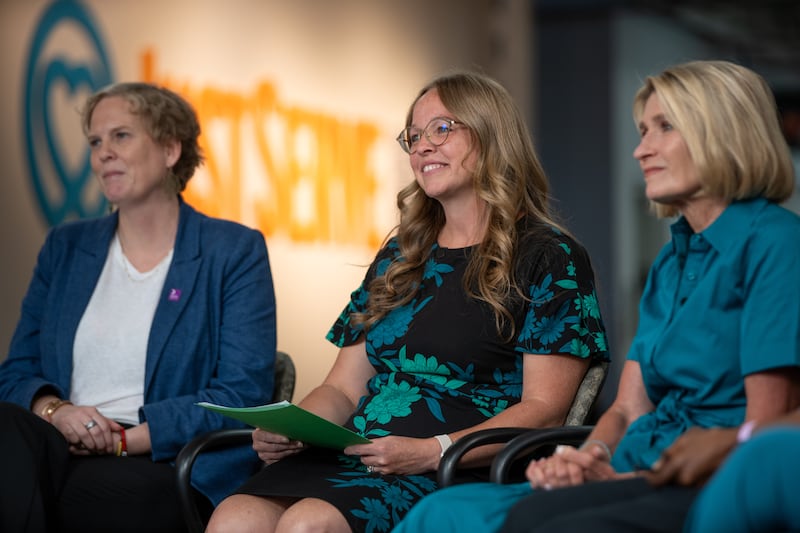 Elissa Gifford, President Camille N. Johnson, and Sarah Bouchie listen during the Church News podcast taping in the Humanitarian Center.
