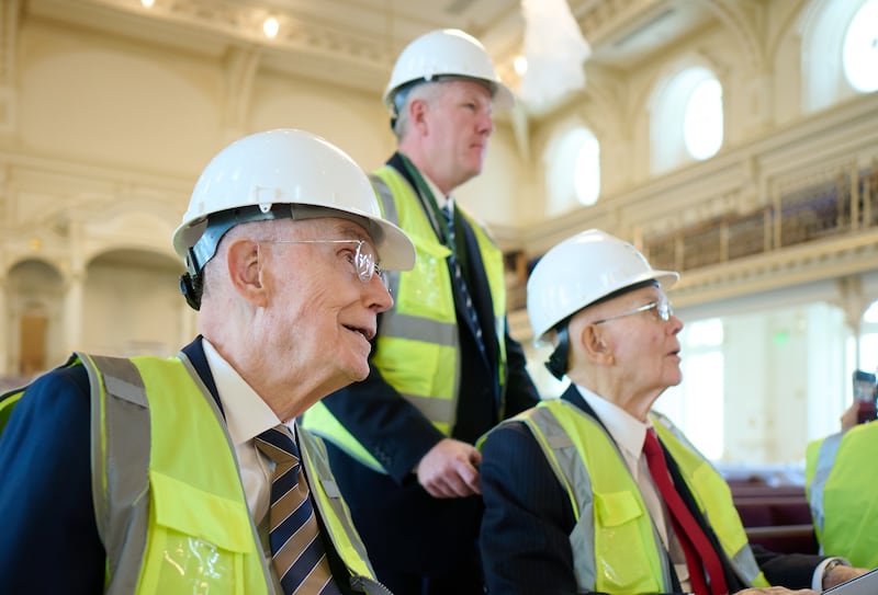 President Dallin H. Oaks, right, and President Henry B. Eyring, left, tour the Salt Lake Temple assembly room.