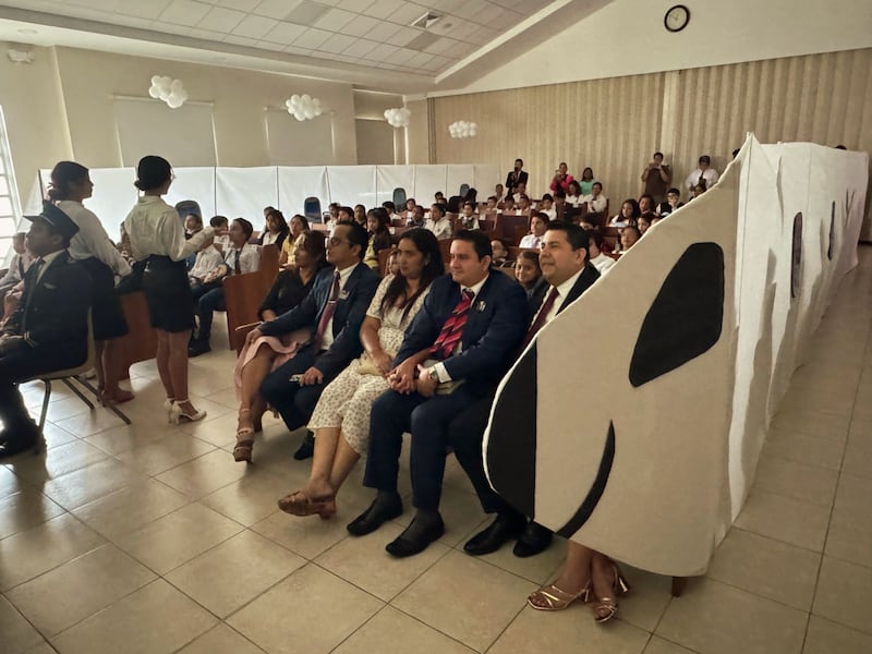 Primary children and leaders of the Samborondón Ecuador Stake sit aboard a fake airplane during the stake's mini missionary training center activity in Guayaquil, Ecuador, Feb. 21, 2026.