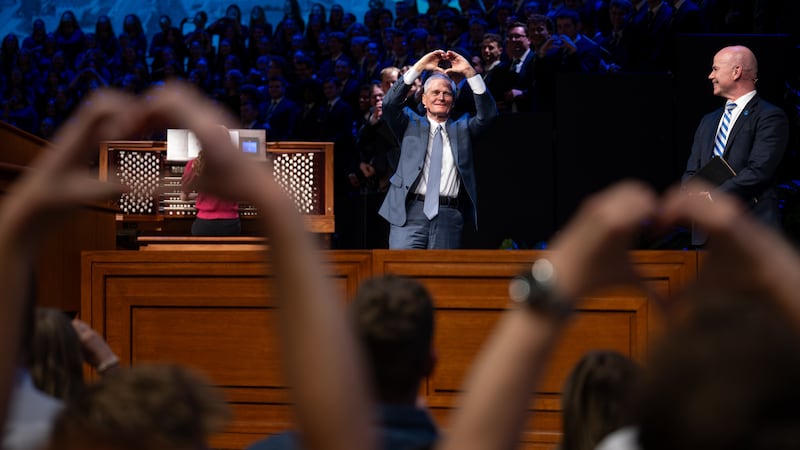 Elder David A. Bednar, a member of the Quorum of the Twelve Apostles, and his wife, Sister Susan Bednar, speak during a devotional at the BYU-Idaho Center in Rexburg, Idaho, on Thursday, Oct. 8, 2026.