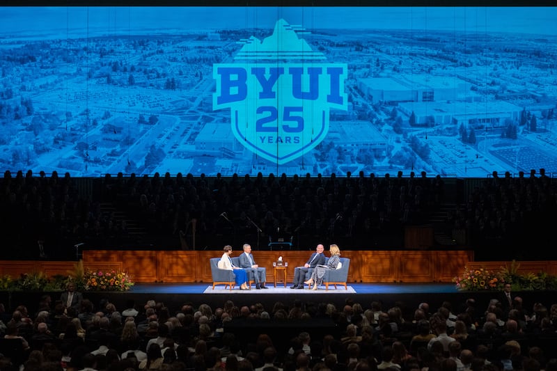 Elder David A. Bednar of the Quorum of the Twelve Apostles, and his wife, Sister Susan Bednar, left, respond to questions from BYU–Idaho President Alvin F. Meredith III and Sister Jennifer Meredith, during a devotional held in the BYU-Idaho Center in Rexburg, Idaho, on Thursday, Oct. 8, 2026.
