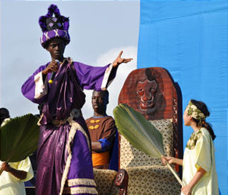 A young man from Accra, Ghana, portrays King Noah from the Book of Mormon during a production held o