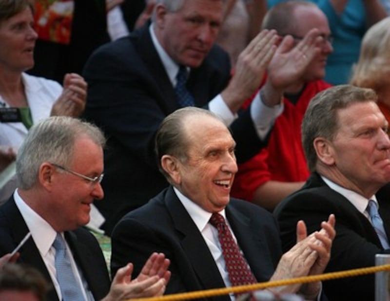 President Thomas S. Monson, smiles as he applauds the Mormon Tabernacle Choir during their performan