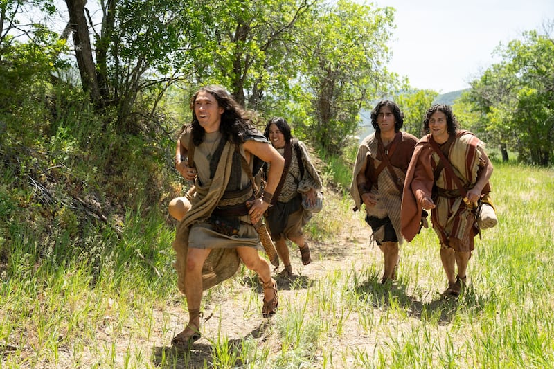 The sons of Mosiah run to greet Alma in this scene from the Book of Mormon Videos.