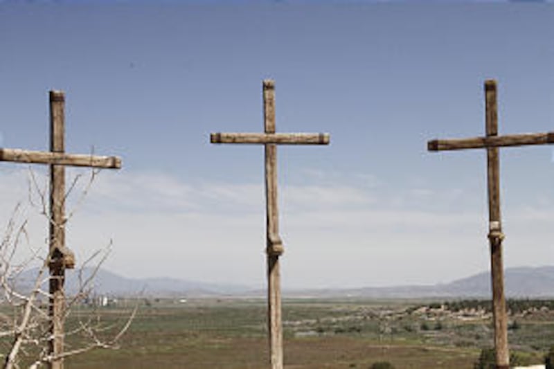 The three crosses of Golgotha are located at the edge of a cliff overlooking the Goshen Valley at th