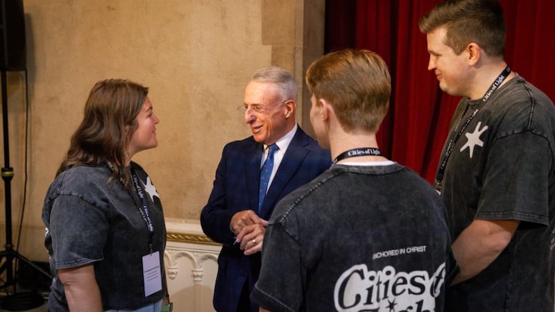 Elder Ulisses Soares of the Quorum of the Twelve Apostles, center, speaks with young single adults at the United States Northeast Area Young Single Adult Cities of Light conference in New York City on Saturday, Sept. 19, 2026.