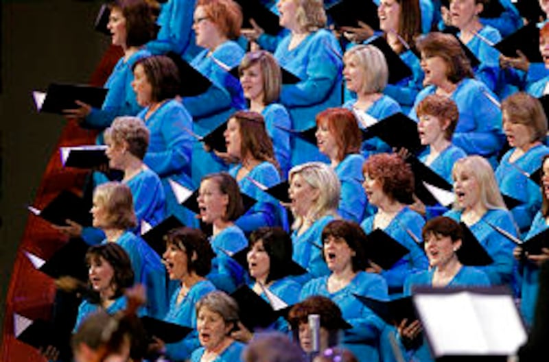 Members of the Tabernacle Choir sing during the First Presidency's Christmas Devotional Sunday, Dec.