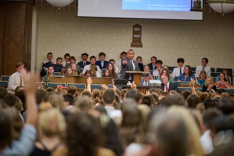 Elder Vaiangina Sikahema participates in a Q&A with youth in a chapel in Indianapolis, Indiana.