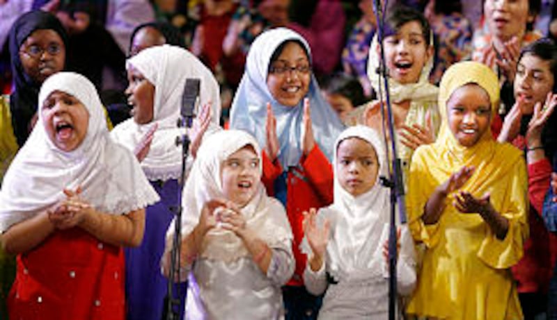 Muslim Children's Choir sing during an Interfaith Musical Tribute to the Human Spirit at the Tabern