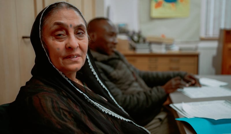 A woman speaks during an English as a Second Language class held at the Wembley Friendship and Outreach Center.