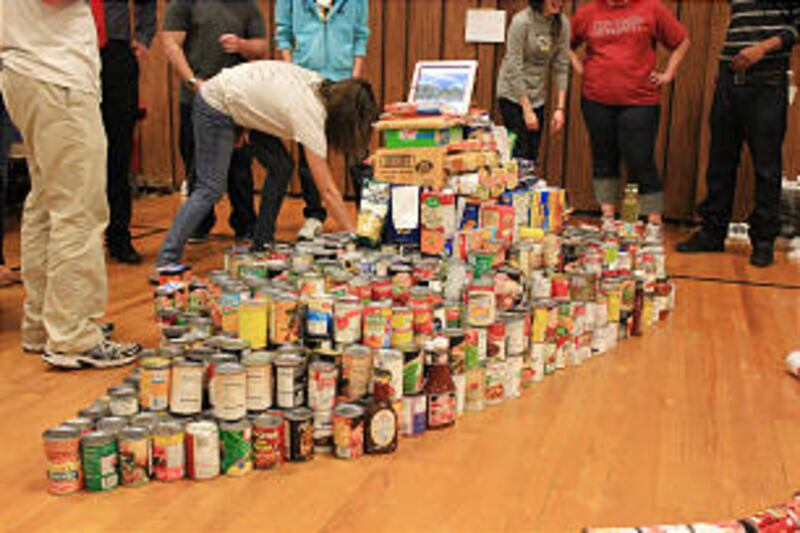 The Flat Iron YSA Ward creates Noah's Ark canned food sculpture.