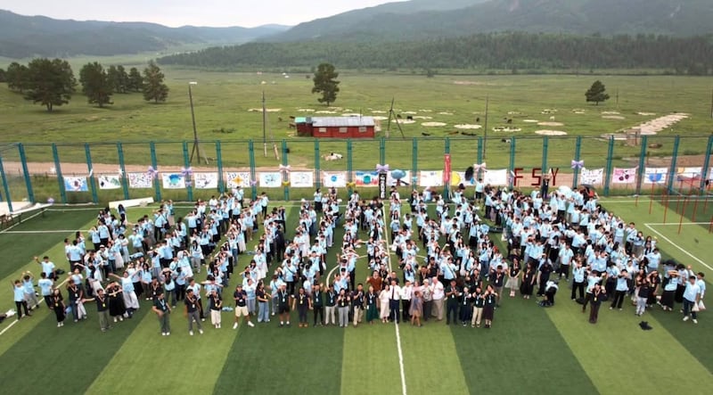 Participants gather for a photo during a For the Strength of Youth Conference at the Dugan Khad Resort near Ulaanbaatar, Mongolia, from June 28 to July 3, 2026.