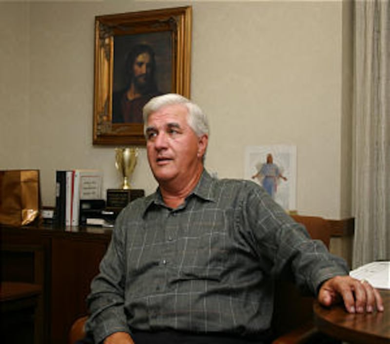 Bishop Robert Painter chats in his office on a weeknight. In Yosemite's shadow, he found the peace h
