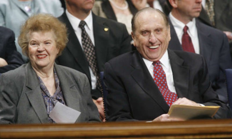 President Thomas S. Monson with his wife, Sister Francis Monson, seated on the stand before he spoke