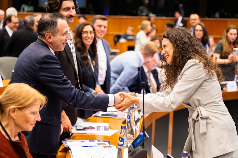 Francesco Di Lillo, director of The European Union and International Affairs Office of The Church of Jesus Christ of Latter-day Saints, left, shakes hands with Antonella Sberna, vice president of European Parliament, right, during the panel discussion titled “AI, Health and Fundamental Rights: Implementing Europe's Human-Centric Approach” on June 9, 2026 at the European Parliament in Brussels, Belgium.