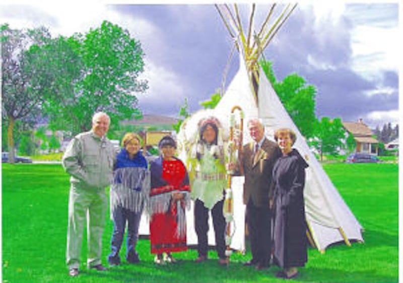 Elder Keith K. Hilbig and his wife, Susan, right, stand at display on tabernacle grounds Sept. 16, w