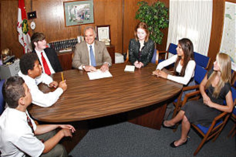 Bishop Kirk Lindahl of the San Clemente California Stake holds a Bishop's Youth Committee meeting. A