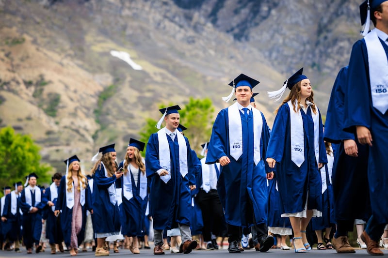 BYU graduates line up outside the Marriott Center in preparation for commencement on Thursday, April 23, 2026, in Provo, Utah.