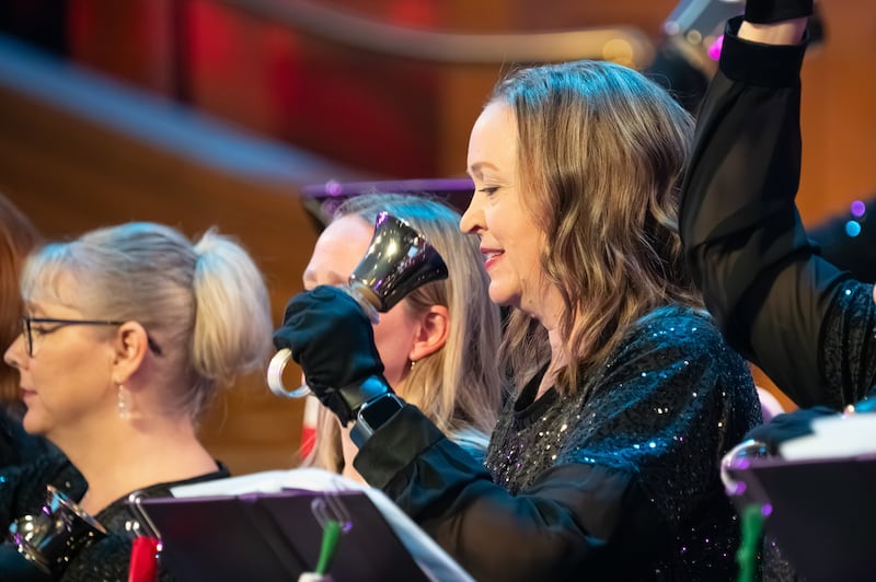 Members of the Bells at Temple Square perform during “Ringing in the Season of Light” holiday concert in the Tabernacle on Temple Square in Salt Lake City on Nov. 21, 2025.