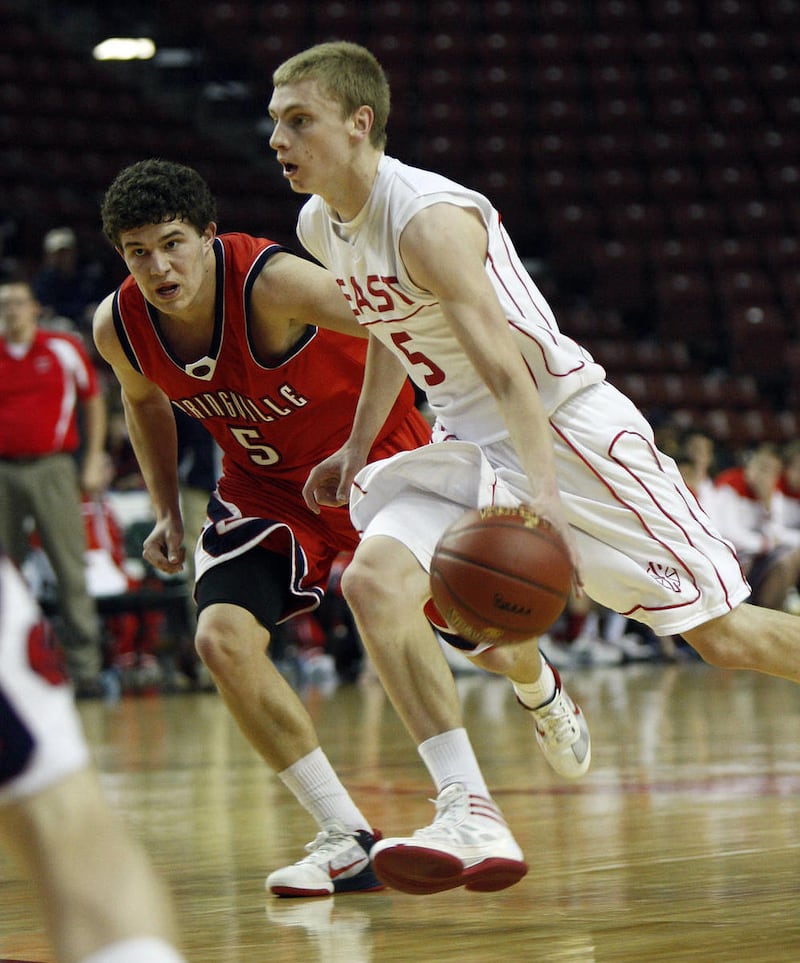 East High's Parker Van Dyke drives in the first round of the 4A State High School boy's basketball tournament Monday, Feb. 27, 2012, in West Valley City, Utah.