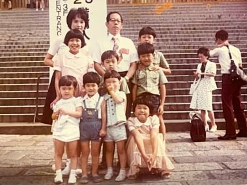 Picture of the Tokuzawa family and friends at the Aug. 9, 1975, Japan Area General Conference. Seiji Tokuzawa was 10 years old.