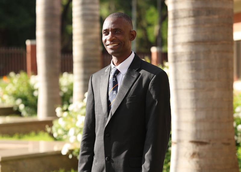 Kilford Shereni stands on the grounds of the Harare Zimbabwe Temple.