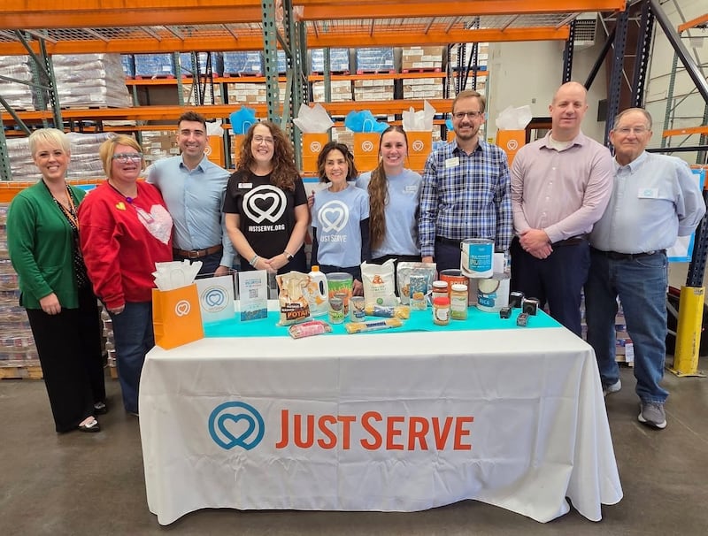JustServe and High Plains Food Bank volunteers pose for a photo with food donations from The Church of Jesus Christ of Latter-day Saints in Amarillo, Texas, on Thursday, Feb. 5. A semitruck full of food was delivered to the food bank as part of a larger donation to 250 food banks across the country in celebration of the 250th anniversary of the United States.